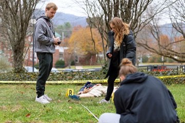 Criminal Justice students work a mock crime scene