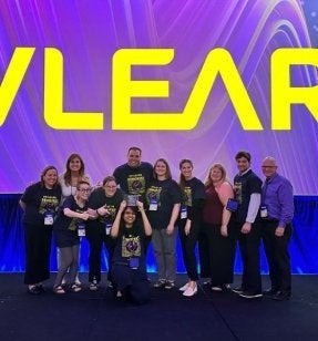 MS Instructional Design and Technology students holding an award