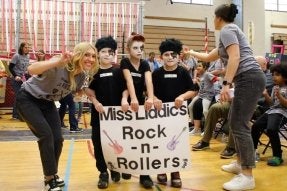 Three young students dressed like the band "Kiss" and their teacher as part of the annual Kent's Fest for hildren and adults with exceptional needs located in Clinton, Centre and Lycoming counties