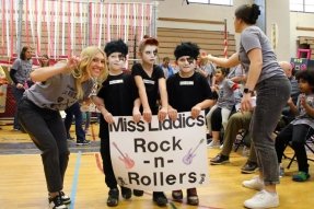 Three young students dressed like the band "Kiss" and their teacher as part of the annual Kent's Fest for hildren and adults with exceptional needs located in Clinton, Centre and Lycoming counties