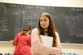 A Middle Level Education major at CU in a middle school classroom as part of her field experience