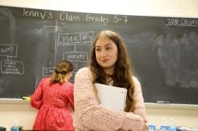 A Middle Level Education major at CU in a middle school classroom as part of her field experience