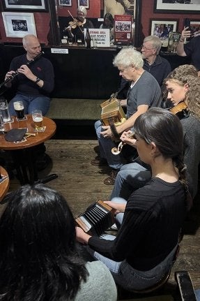 Irish musicians performing in a pub.