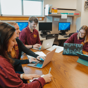MS Speech-Language Pathology graduate students working on a project