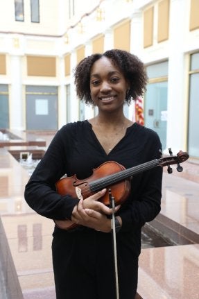 Sanai Castle with her violin.