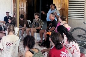 Village mayor Ms. Raquel speaking to CU students in Belize. 
