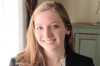 A headshot of a woman. 