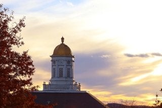 A sunset with a building. 