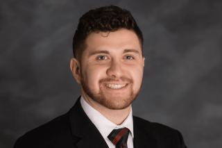 A headshot of a man. 