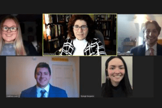 A screenshot of a zoom call with 5 people in it. 