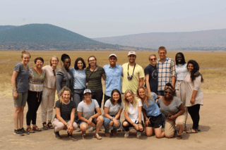 A group of people together outside.