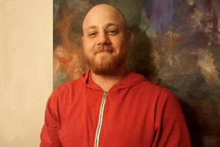 A headshot of a man. 