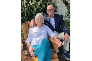 A couple sitting next to each other. 