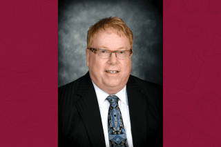 A headshot of a man. 