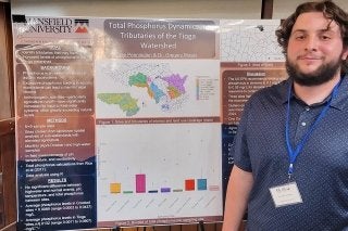 Cole Pennington with his winning research poster.