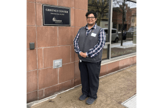 Luis Medina stands in front of the Greenly Center