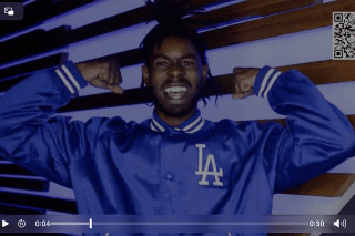 The digital forensics major, who’s also heavily involved in multimedia entertainment, is among the small cast featured in a Major League Baseball apparel commercial. 