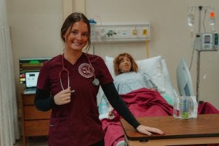 Lock Haven Nursing Student in nursing lab