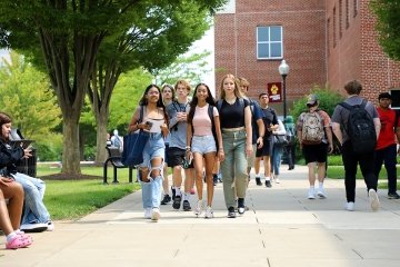 Freshmen walk to class on the first day of the fall semester.