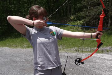 Someone shooting a bow. 