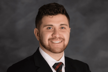 A headshot of a man. 