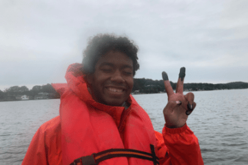 Watershed student giving peace sign