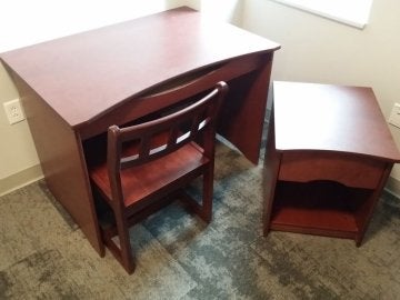 Desk, chair and side table in bedroom in David Soltz Hall
