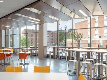 Tables and chairs in the dining area in David Soltz Hall