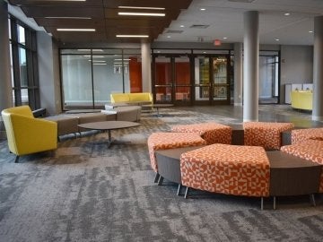 Main lobby of David Soltz Hall showing various setting areas.