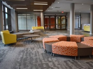 Main lobby of David Soltz Hall showing various setting areas.