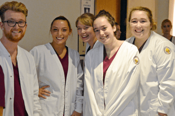 A group of nursing students standing together. 