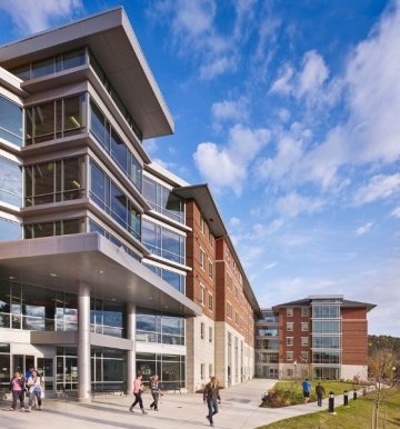 Commonwealth University-Mansfield, formerly Mansfield University, residence halls dorms and students walking through campus in Twin Tiers