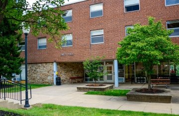 Exterior of Smith Residence Hall at CU-Lock Haven in the summer