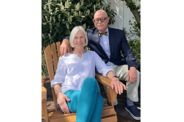 A couple sitting next to each other. 