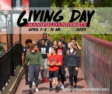 A group of students walking on campus. 