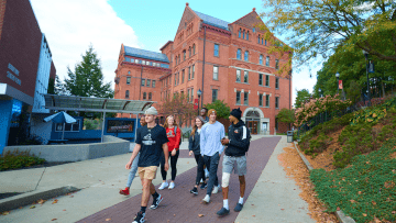 Students walking on campus. 
