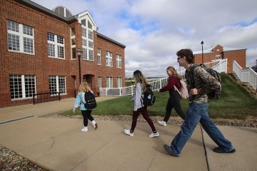 Clearfield students walk toward Founders Hall