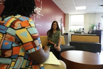 Social work major talks with fellow student at Commonwealth University-Lock Haven