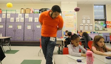 An education major observes kindergarten students in action at a Williamsport area elementary school.