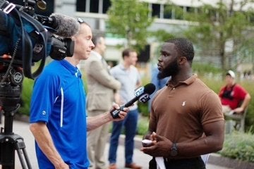 Joar Dahn speaking with media during his campaign