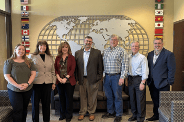 Accounting Association guest speakers pose for photo 