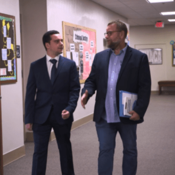 Daniel Teeter '25 walks with professor Jonathan Rothermel