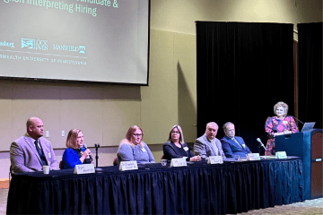 Elizabeth Shotwell '02/'08M speaks with students at a recent CATCH event