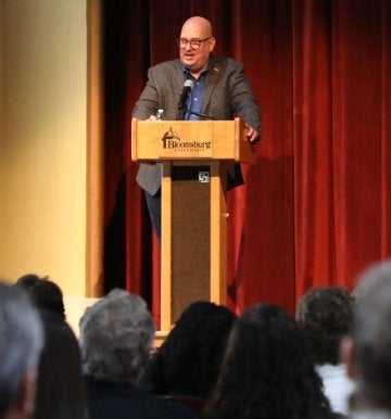 Keynote Speaker, Ronn Cort, on stage at the 2025 ZIPD Conference at CU-Bloomsburg
