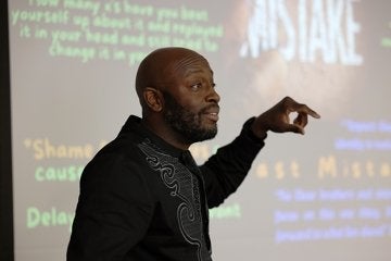 Keynote on personal ownership and time management anchored a day of sessions on mental health, community support, and thriving beyond the classroom.