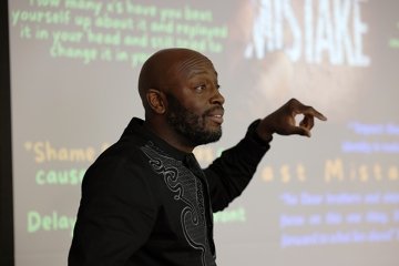 Keynote on personal ownership and time management anchored a day of sessions on mental health, community support, and thriving beyond the classroom.