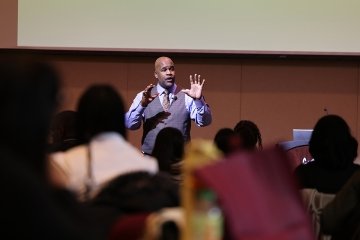 Keynote on personal ownership and time management anchored a day of sessions on mental health, community support, and thriving beyond the classroom.