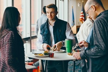 Student networking during lunch at the 2025 ZIPD Conference at CU-Mansfield