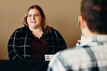 Presenter speaking at the 2025 ZIPD Conference at CU-Mansfield