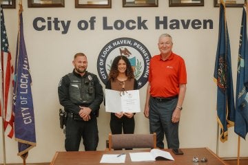Shown, from left, are officer Andrew Fisher, Mckenzi Brooks and Gary Langsdale, American Red Cross volunteer and board member.